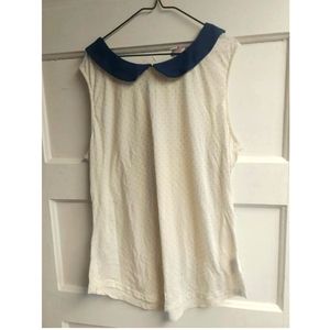 Collared polka dot sleeveless blouse
